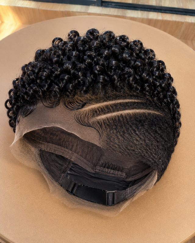 Deep Black Curls And Double Carved Lines Reveal The Raw Artistry Of A Fully Exposed Cap #thebestwomenshaircuts