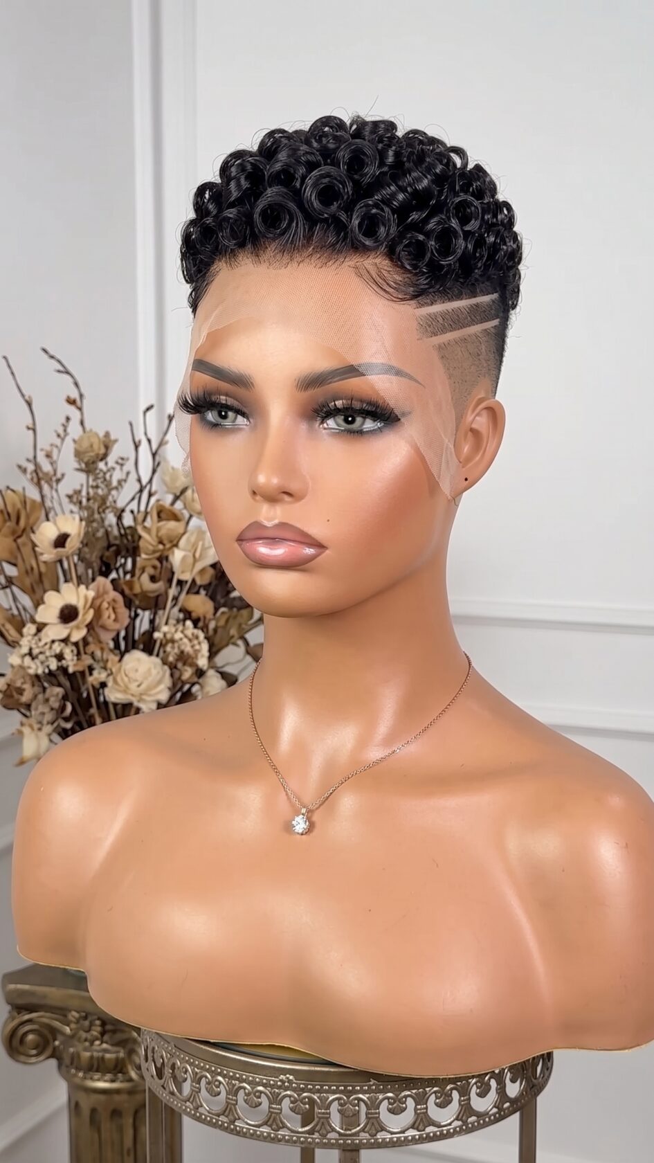 A Mannequin Display Proves How A Low-Cut Coiled Crop Balances Razor Lines Against Soft Edges #HaircutStyleIdeas